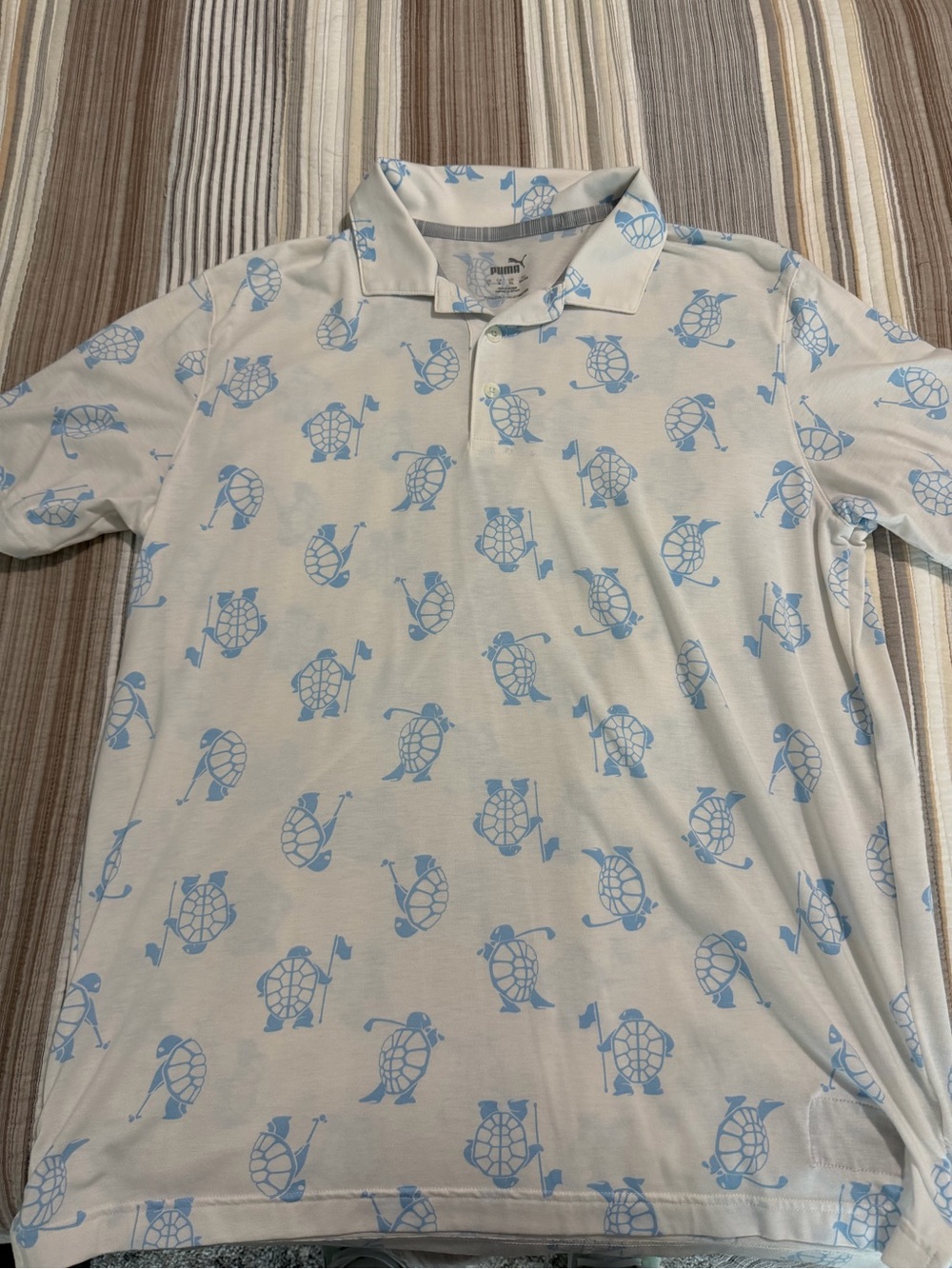 Puma Men’s White Polo with Light Blue Turtle Print